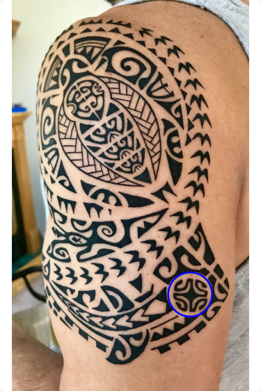Polynesian shoulder tattoo