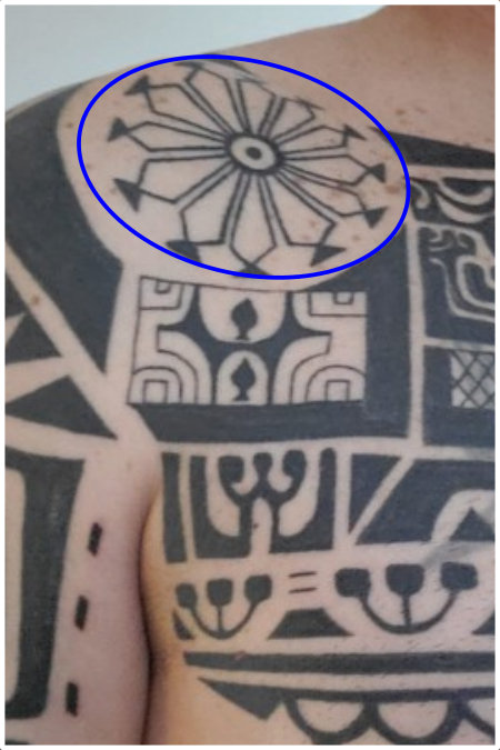 Marquesan sleeve and pec tattoo